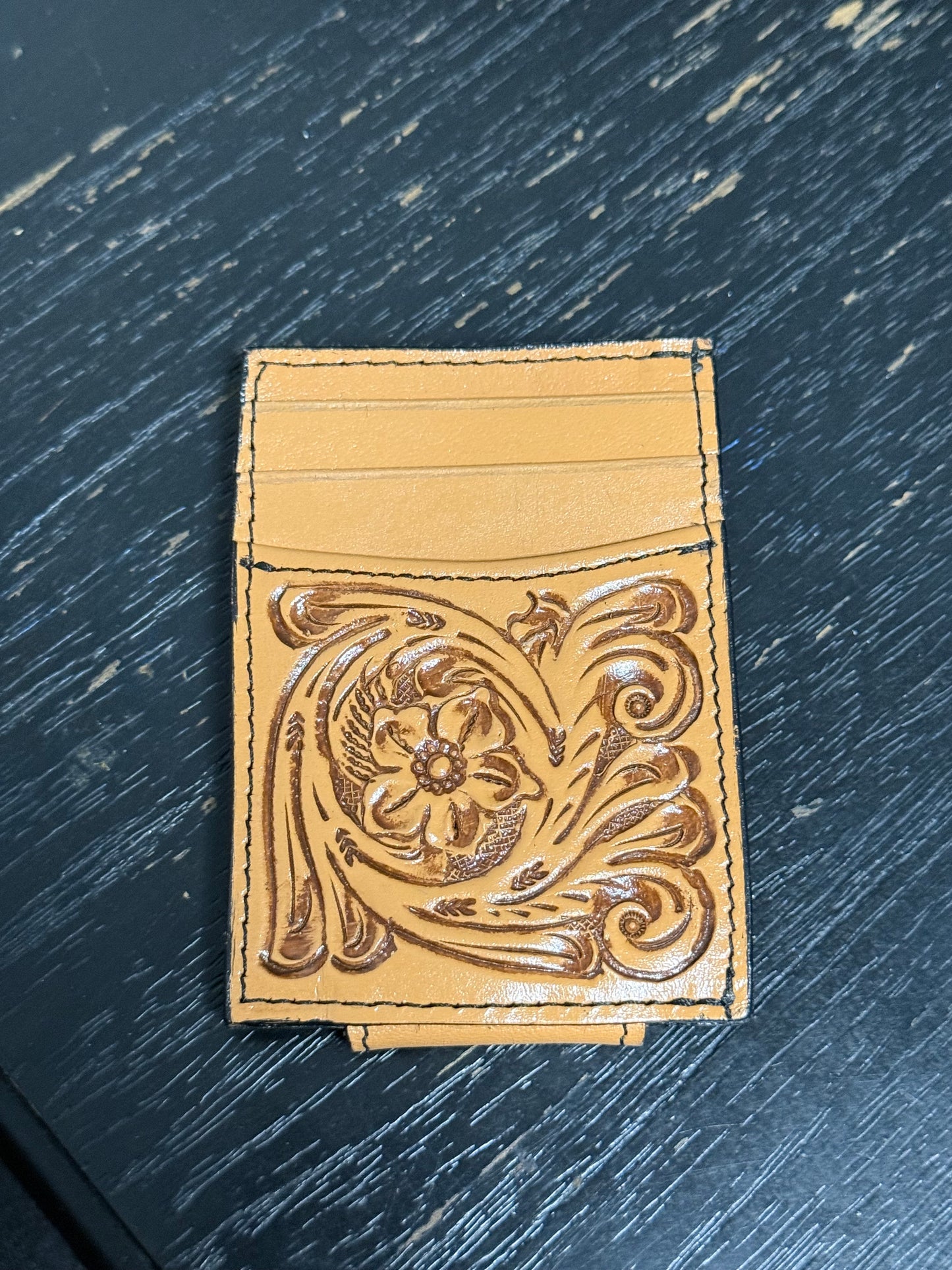 Tooled leather wallet with magnetic money clip