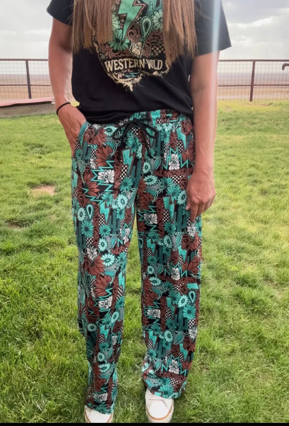 Tattoos In Turquoise Pants