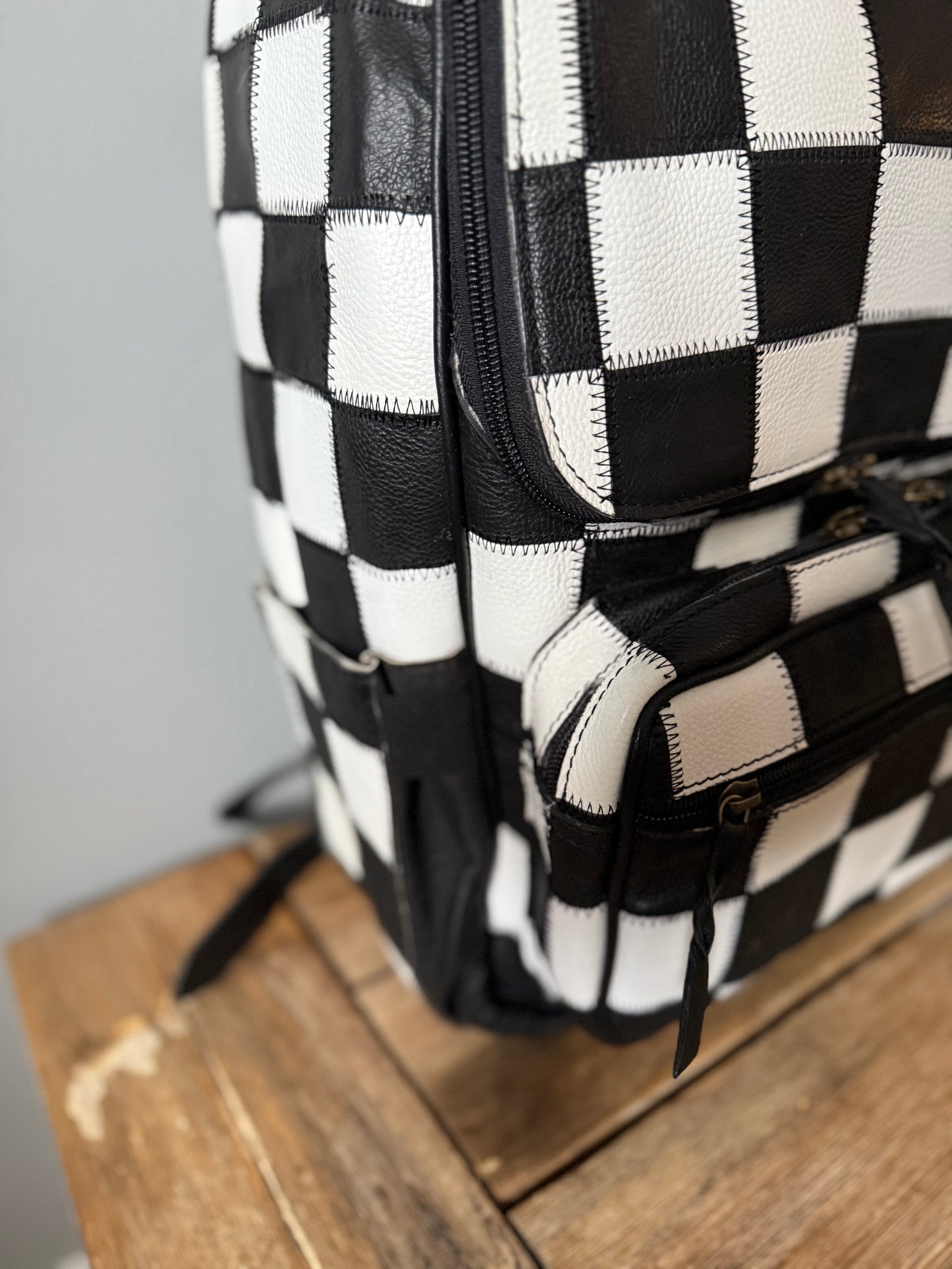 The Checkered Backpack