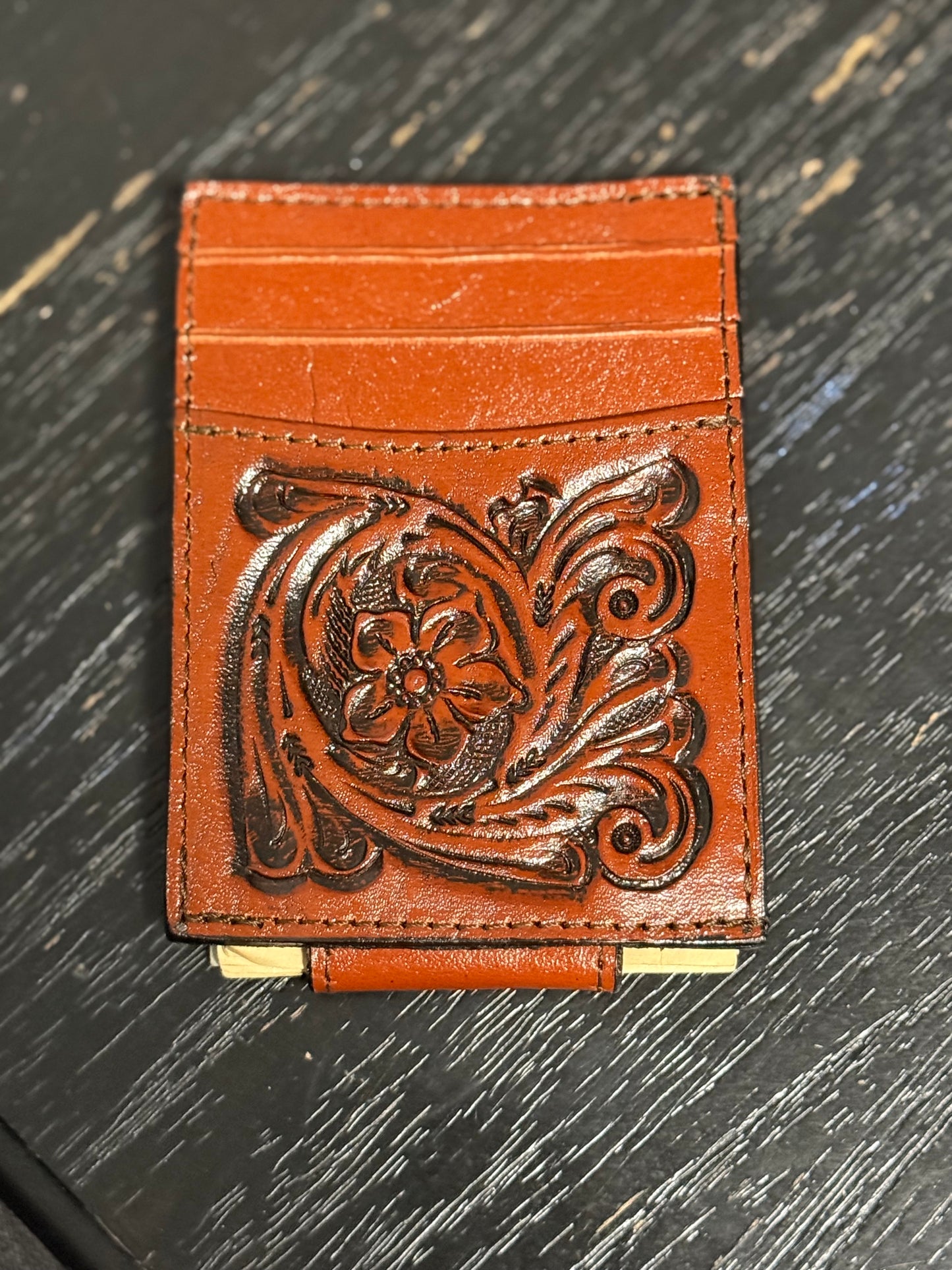 Tooled leather wallet with magnetic money clip