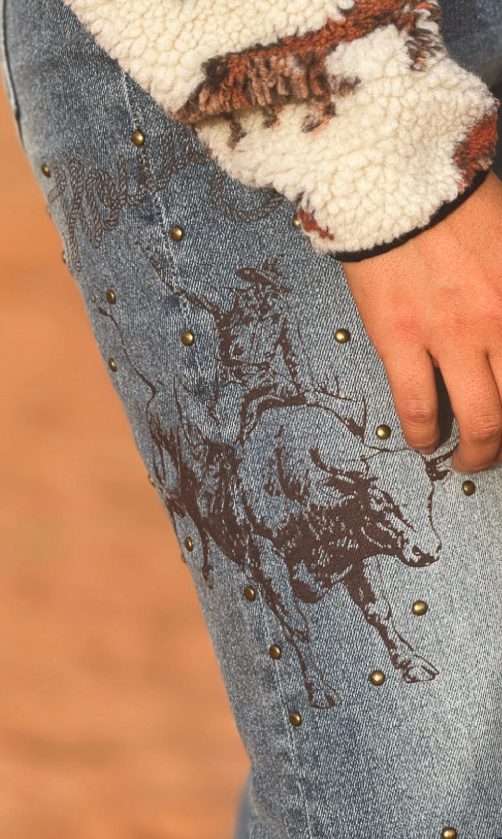 MID WASH DISTRESSED KNEE RIP STUDDED PRINTED BRONCO CUFFED CROPPED STRAIGHT LEG JEANS (28IN AFTER FOLD)