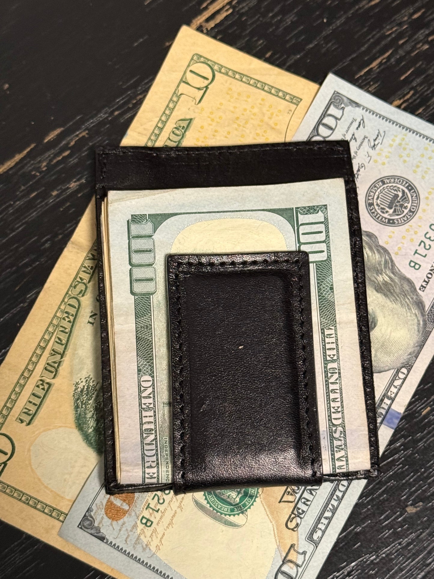 Tooled leather wallet with magnetic money clip